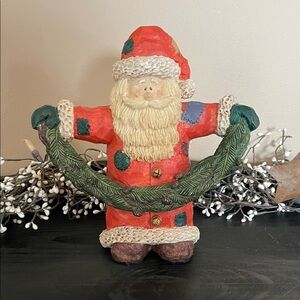 Festive Resin Santa Claus Holding Garland Figurine - Red and Green - 8x9 Inches